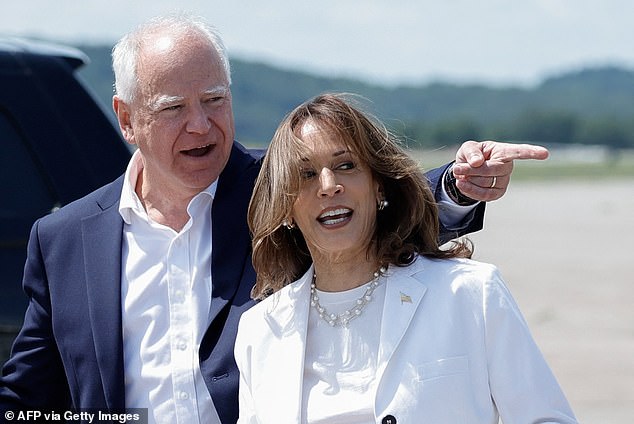 US Vice President and 2024 Democratic presidential candidate Kamala Harris (R) and her running mate Minnesota Governor Tim Walz arrive at Chippewa Valley Regional Airport in Eau Claire, Wisconsin, August 7, 2024. Harris and Walz are speaking at a campaign rally in Eau Claire Wednesday