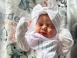 This family photo shows Willow Jade Dellaquila, a day after she was born in October 2023, in La Grange, Ky. Willow Jade died at the age of 13-days-old in November 2023, after contracting a Cronobacter sakazakii infection traced to a can of Similac Total Comfort powdered infant formula. (Family photo via AP)