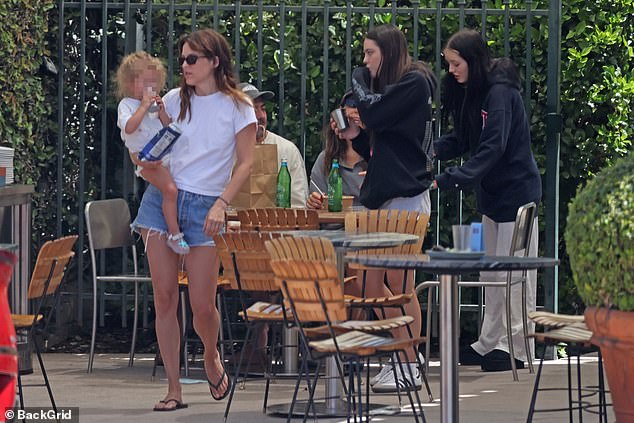 The 35-year-old Mad Max: Fury Road alum rocked a chic summer ensemble while enjoying brunch with husband Ben Smith-Petersen, their two-year-old daughter Tupelo, and Riley's 15-year-old twin sisters, Finley and Harper Lockwood