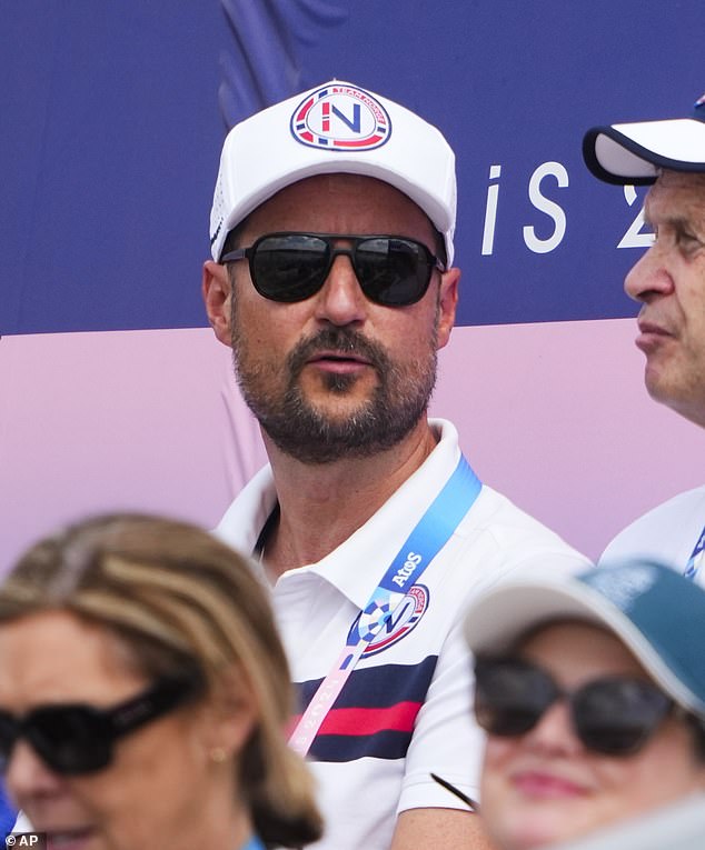 The 51-year-old appeared in calm spirits as he watched the women's kayak 500-meter semifinals