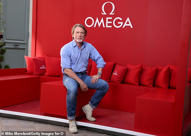 Daniel Craig looked suave as he rocked his new long-haired look and a greying beard for a special visit to the Olympics in Paris on Thursday