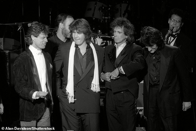 Pictured: Mick Jagger, Pete Townshend, Mick Taylor, Keith Richards and Ronnie Wood at the Rock and Roll Hall of Fame at the Waldorf Astoria, New York in January 1989