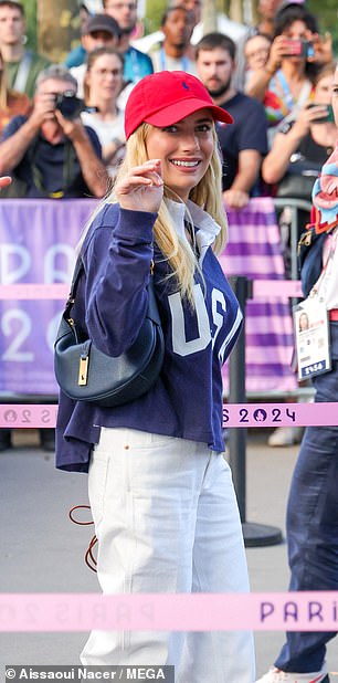 Roberts seemed to take her time to allow for photos and then went to watch the game