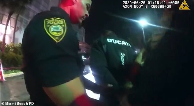 After Scott loudly challenged the officer on previous statements, officers handcuffed him and placed him into custody