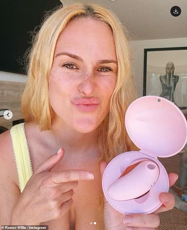 Her original post featured two snaps of the star holding the pink sex toy in her hand