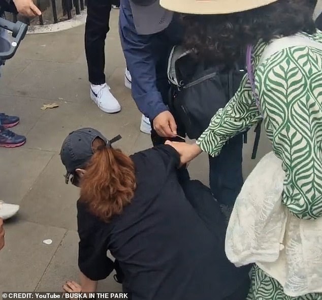 In a seemingly unprecedented move, the King's Guard told a person filming him to 'get a police officer' to assist the injured woman