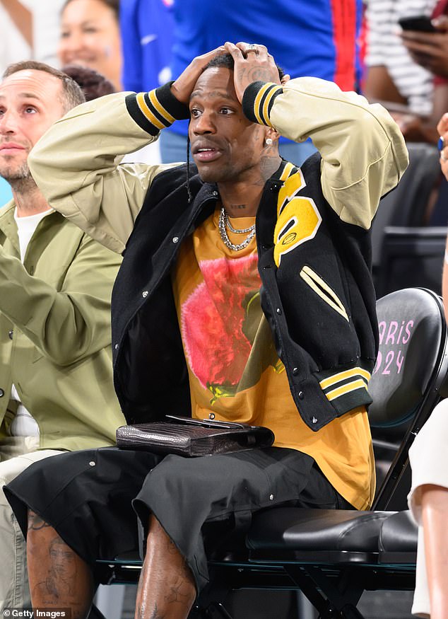 Travis Scott attends the men's basketball semi-final match between Team France and Team Germany on day thirteen of the Olympic Games Paris 2024 at Bercy Arena on August 08, 2024 in Paris, France