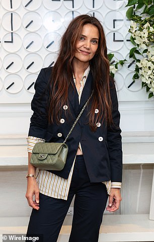 Suri looked near identical to mom Katie (pictured June)