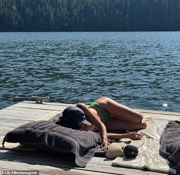 The beauty also ensured she got plenty of rest in as she soaked up some rays on a wooden deck