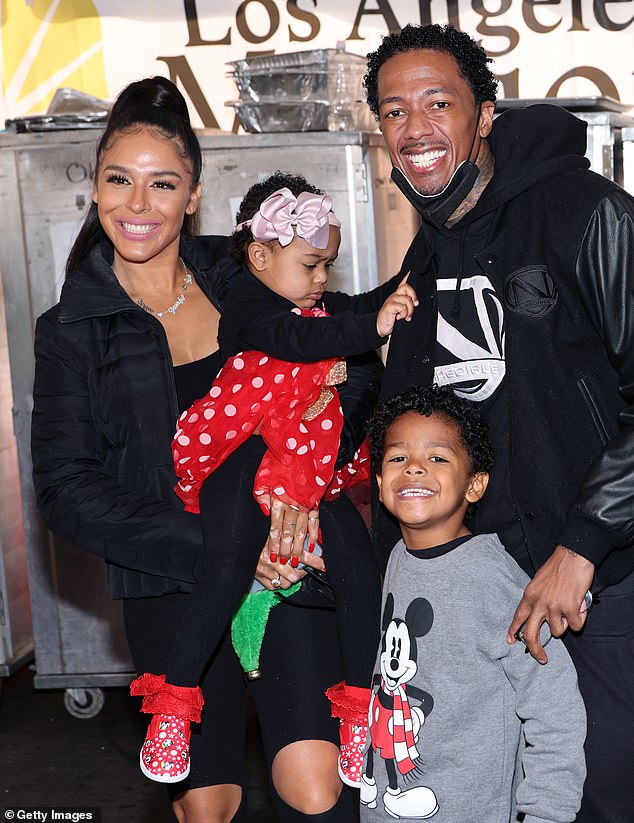 He and beauty queen Brittany Bell welcomed two children, son Golden in 2017 and daughter Powerful Queen in 2020; Brittany, Nick, Powerful and Golden seen in 2022