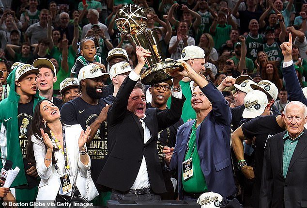 Celtics owner Wyc Grousbeck (center) announced he was selling the team after it won the 2023-24 championship