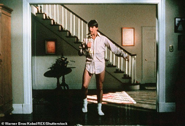 The 1983 Tom Cruise film Risky Business (pictured) has had its rating reduced from 18 to 15 because its references to 'sex work, oral sex and masturbation' are considered comic rather than explicit