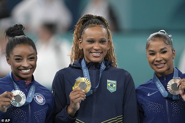 The three gymnasts made history as the first all-black Olympic gymnastics podium in history