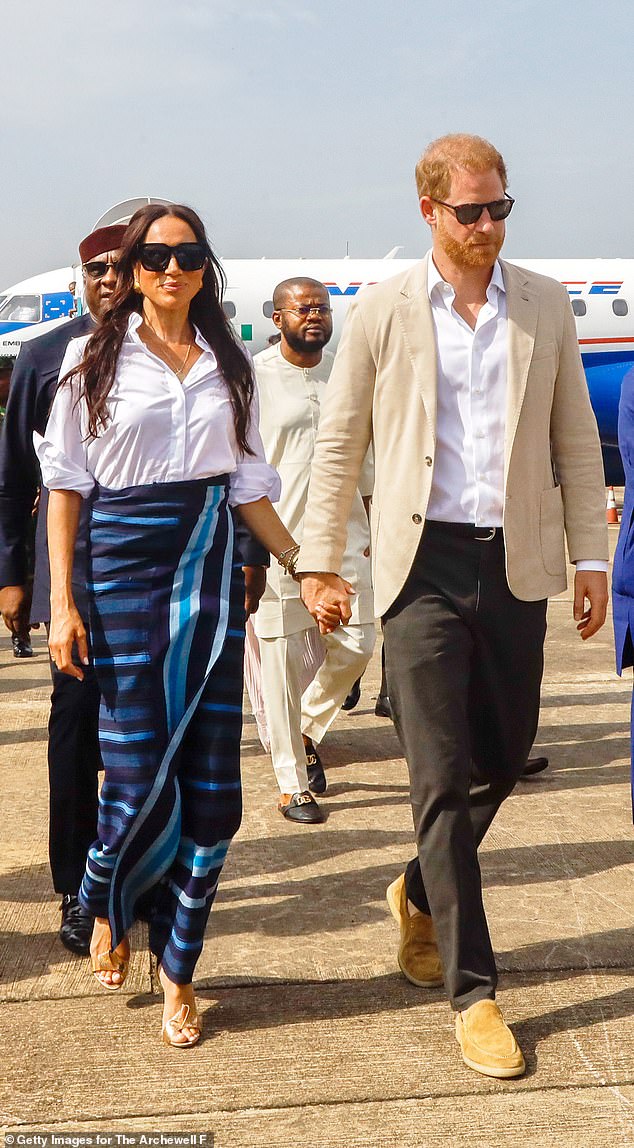 Harry and Meghan arrive at the Lagos airport for Official State Welcome on May 12, 2024 in Lagos, Nigeria