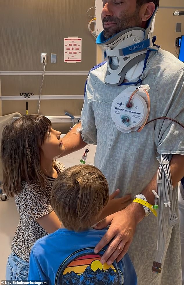 Schulman also included heartwarming pictures and video of his family rallying around him and comforting him in the hospital