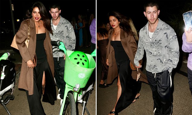 Nick Jonas and his wife Priyanka Chopra walk hand-in-hand as they enjoy romantic date