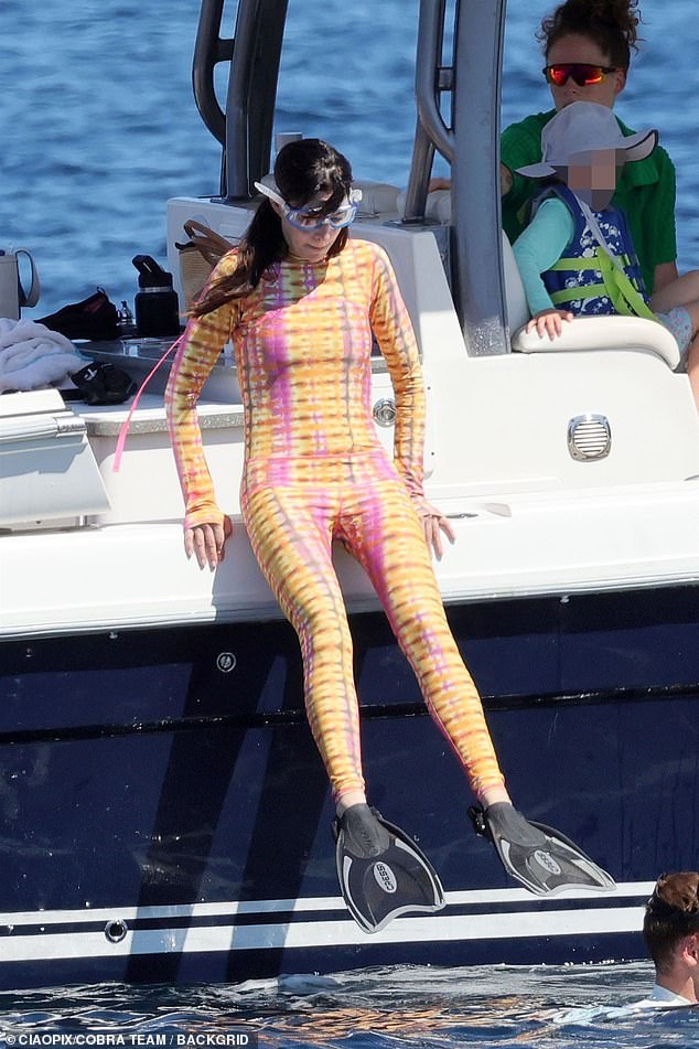 The Devil Wears Prada actress also donned a pair of flippers and goggles and launched herself off the side of the boat to paddle around