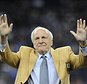 FILE - Detroit Lions head coach Joe Schmidt acknowledges the crowd after receiving a Pro Football Hall of Fame ring during a ceremony at halftime of an NFL football game between the Detroit Lions and the Chicago Bears, Oct. 18, 2015, in Detroit. (AP Photo/Jose Juarez, File)