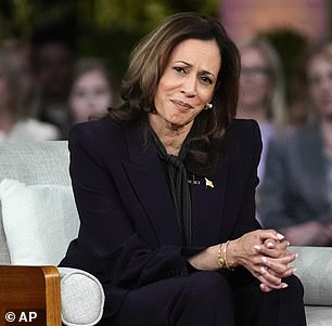 The star was slammed by fans after she failed to endorse Kamala Harris over Donald Trump during a recent interview with The Guardian, and stated 'there's problems on both sides'; Harris seen earlier this month in Michigan