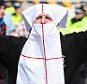 EDL: Around 2,000 'protestors' - some dressed in makeshift Burqas daubed in St George's Cross - took to the streets of Blackburn town centre