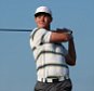 DOHA, QATAR - JANUARY 21:  Oliver Fisher of England hits his tee-shot on the ninth hole during the first round of the Commercial Bank Qatar Masters at Doha Golf Club on January 21, 2015 in Doha, Qatar.  (Photo by Andrew Redington/Getty Images)