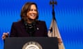 woman speaks at a podium