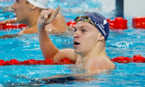 Leon Marchand of France celebrates winning the men’s 200m butterfly final.