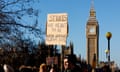 People hold placards during NHS nurses strike