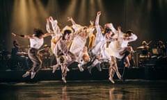 scottish dance theatre's dancers midair in Moving Cloud