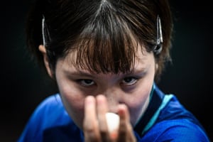 Japan’s Miu Hirano eyes the ball as she prepares to serve to India’s Manika Batra during their women’s table tennis singles round of 16 match