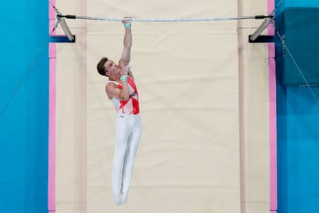 Felix Dolci of Canada performs on the horizontal bar during the men's artistic gymnastics all-around final.