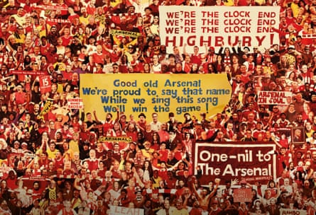 A mural showing fans in the crowd holding up various banners