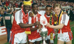 Arsenal's left-right, Kevin Campbell, Paul Davis, David Rocastle and Lee Dixon celebrate the League Championship win in May 1991.