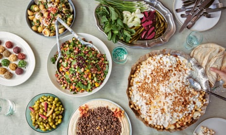 Colourful spread of plates of Middle Eastern food photographed from above