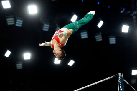 Krisztofer Meszaros of Hungary in action on the high bar.