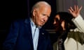 US vice-president Kamala Harris speaks with President Joe Biden on a White House balcony