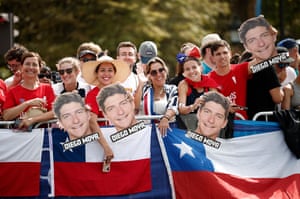 Fans show support for Diego Moya of Chile during the men’s triathlon