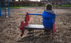 Small boy playing in a park