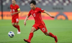 Jin Jingdao, one of the players banned, in action for China against Australia in a World Cup qualifier in 2021.