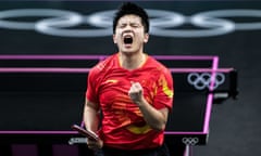 Fan Zhendong celebrates his victory over  Truls Moregard to claim Olympic table tennis gold