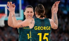 Marianna Tolo and Cayla George celebrate victory in the women's basketball quarter-final against Serbia at Bercy Arena.