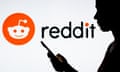 A photo of a woman holding a smartphone in front of the Reddit logo.