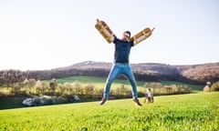 A man attempts take-off with his home-made wings