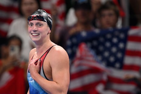 Katie Ledecky of United States celebrates after winning gold and setting a new Olympic record in the women’s 1500m freestyle final.