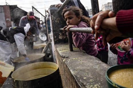 people line up for food