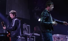 Noel and Liam Gallagher of Oasis on stage