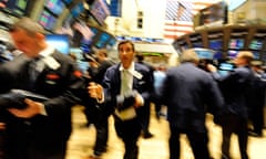 Traders work on the floor of the New York Stock Exchange (NYSE) in New York