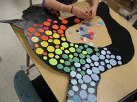 Silhouettes with colored circles... These would look so awesome lining a wall or a fence line during an art show. WOW!