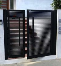 "Add some ornament and beauty to your backyard, garden or poolside with our Modern Stylish Stripe Design Metal Gate. Our Custom Fabricated Metal Gates provide the perfect strength and beauty you desire, all at competitive prices. Our gates will bring you a sense of security and a unique look that is second to none. We use hot-dipped, powder-coated, galvanized steel to ensure your gates are protected against harsh weather and corrosion. You can simply draw the design you would like and we will ma