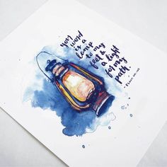 a watercolor painting of a lantern with a quote on it